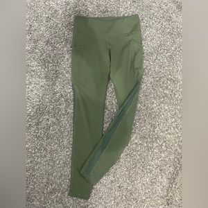 Olive green athletic leggings with mesh detailing